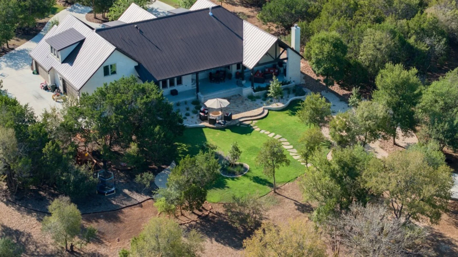 Flagstone Patio, Fire Pit & Landscaping in Bulverde, TX
