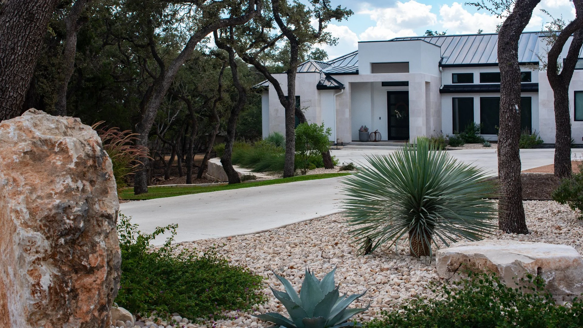 Landscaping Makeover in New Braunfels, TX - Plant Installs, Retaining Wall & More