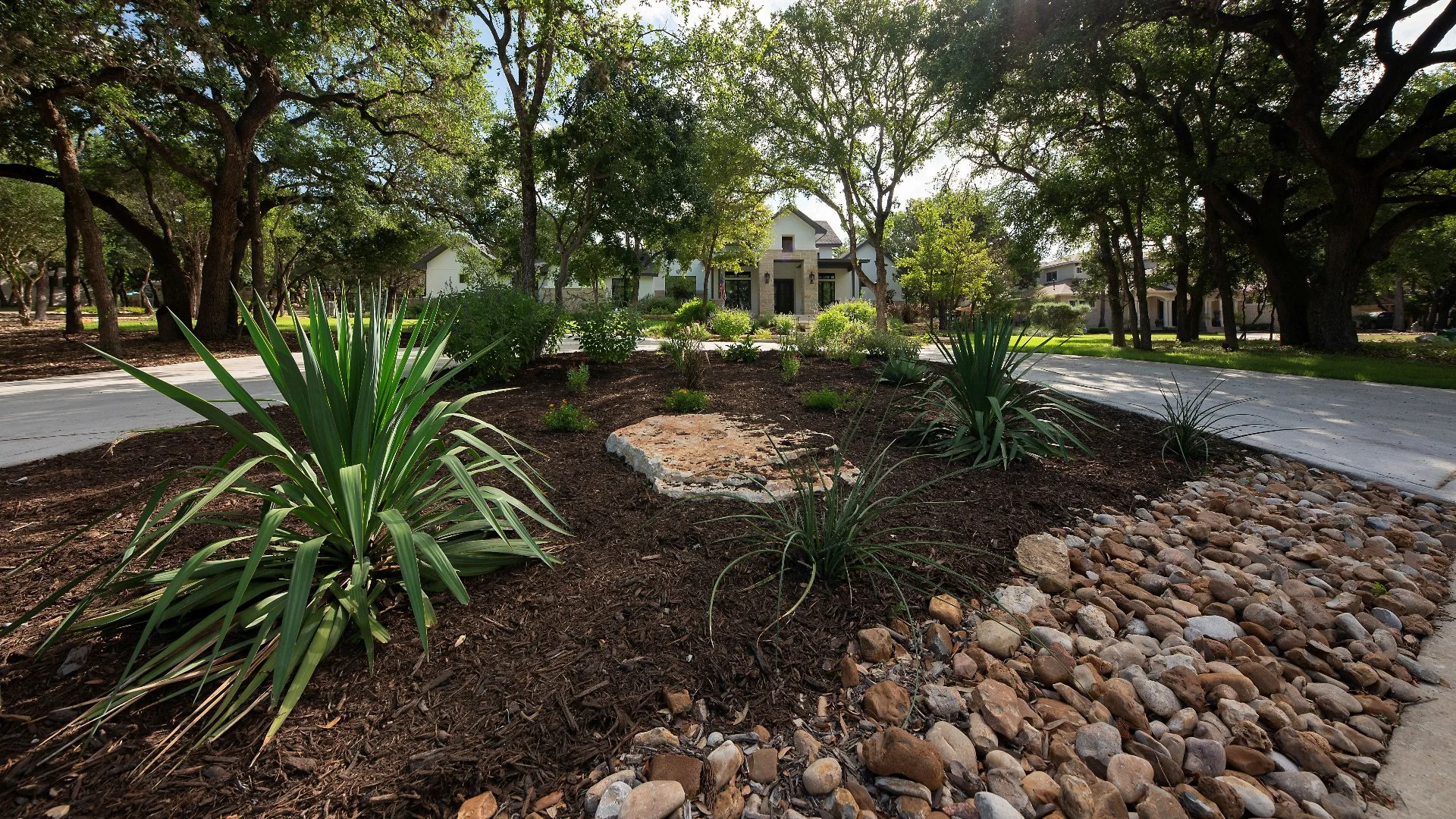 Which Is Better for Landscape Beds: Mulch or Rock?