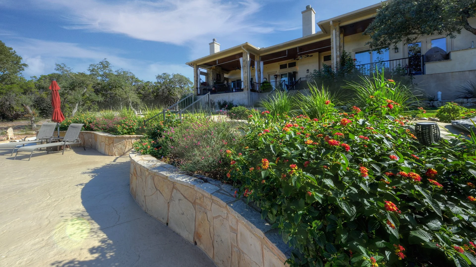 Flagstone Patio & Full Landscaping Transformation in New Braunfels, TX