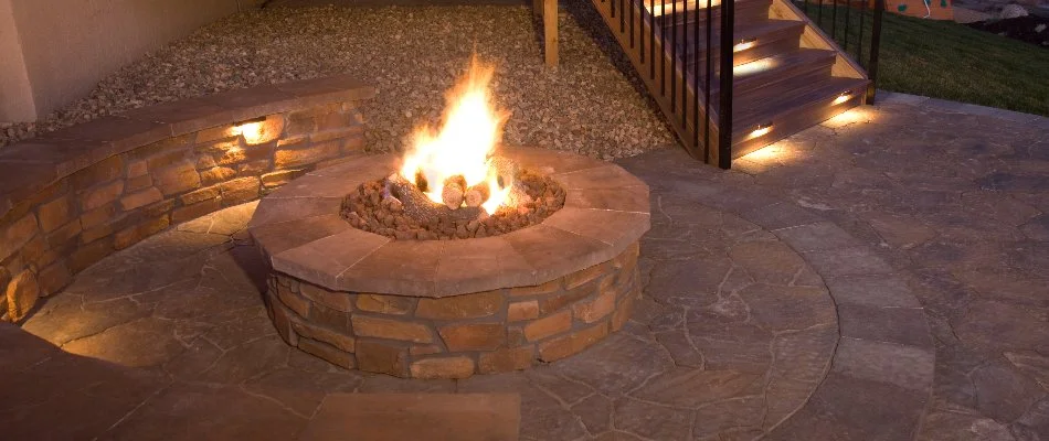 Wood-burning fire pit on a patio in Garden Ridge, TX.